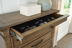 Karallin - Seven Drawer Chest - Medium Brown
