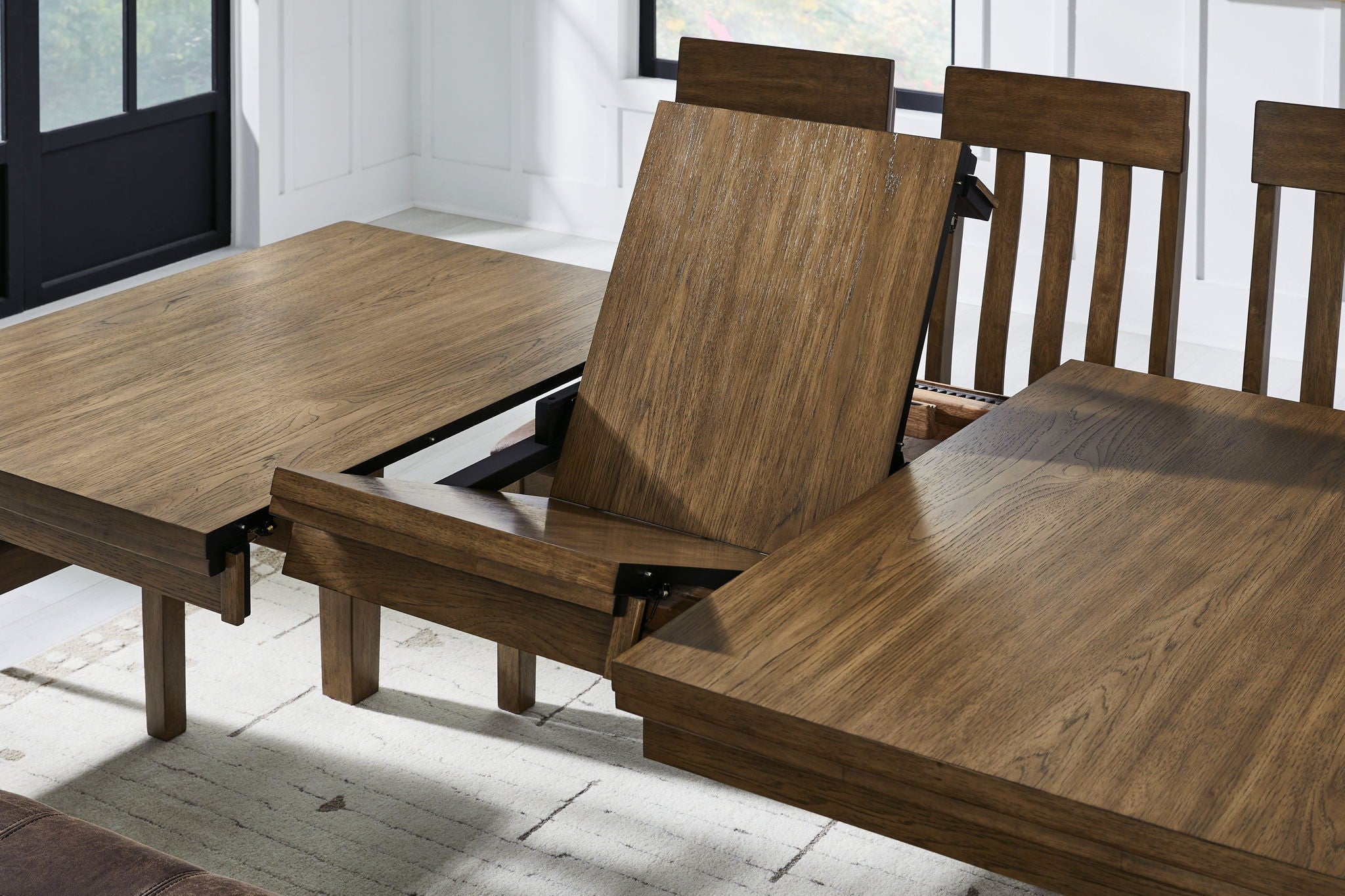 Urbinforte - Dining Room Butterfly Extension Table - Light Brown