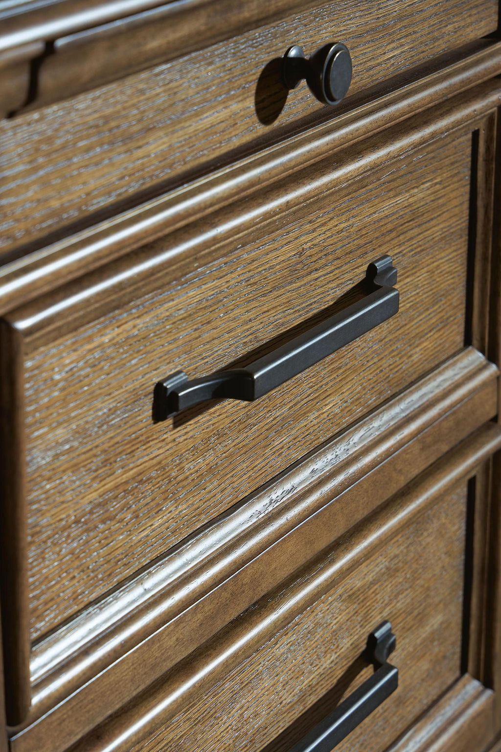 Karallin - Seven Drawer Chest - Medium Brown